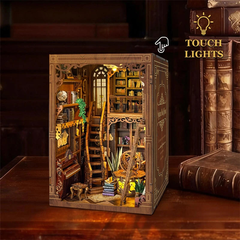 Myriad Books House DIY book nook kit displayed between books on a shelf - view 3